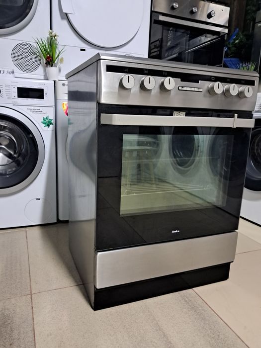 Широка електрична плита Аmica з  духовою шафою на 65л та шириною 60 см