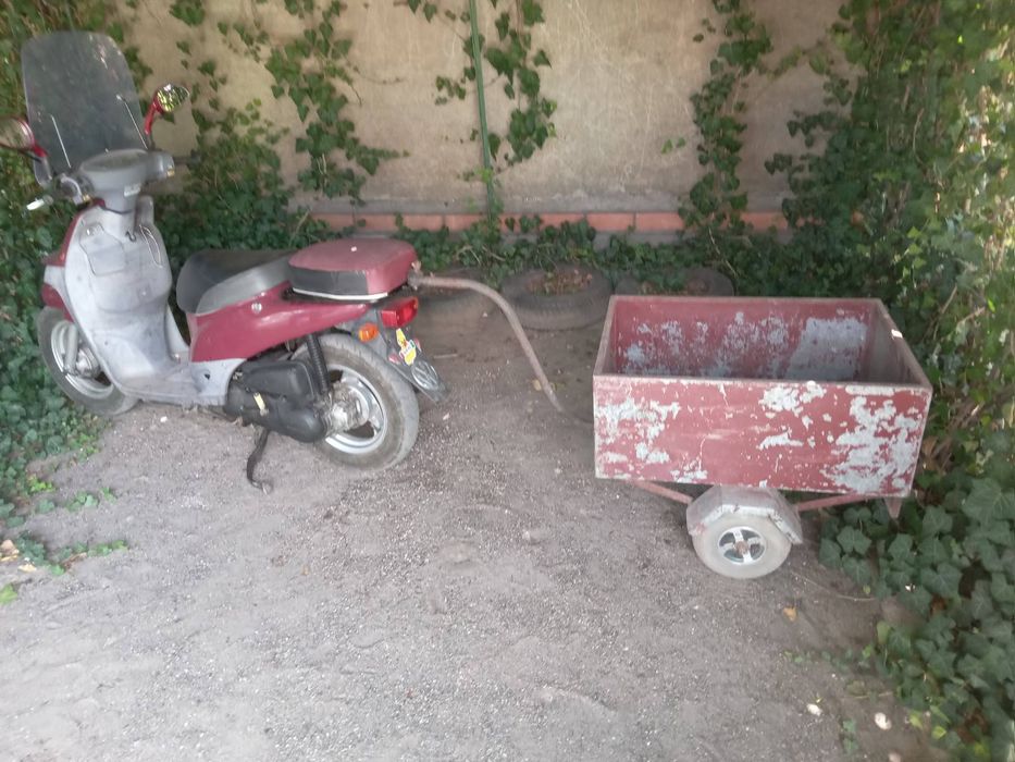 Продам скутер Ноnda  Topik, на ходу. С прицепом