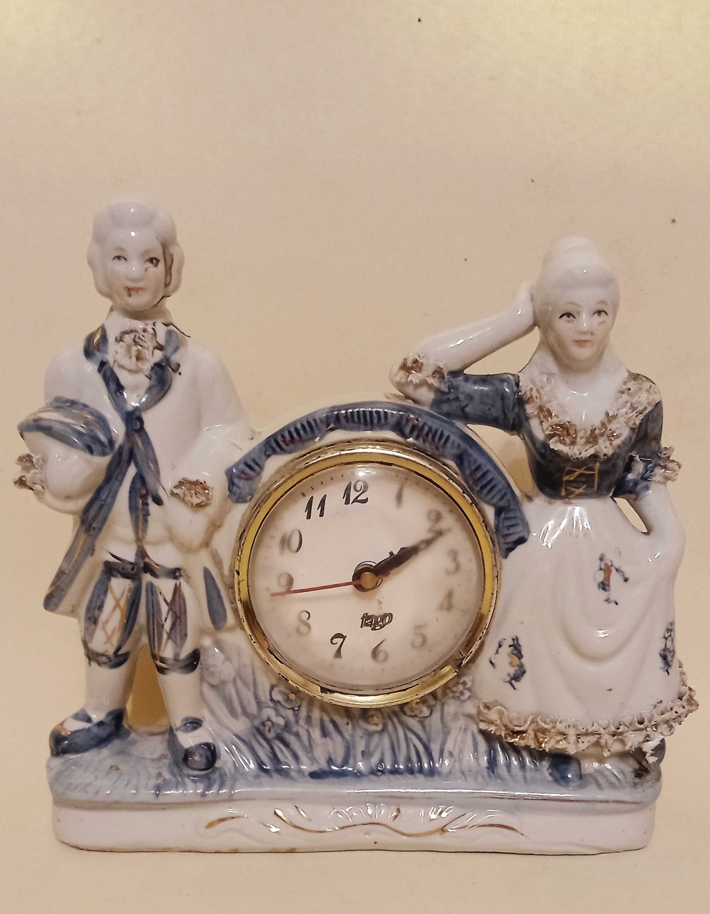 Figurka porcelanowa - figurka porcelanowa z zegarem - ANTYK