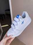 Шкіряні кросівки білі форум adidas