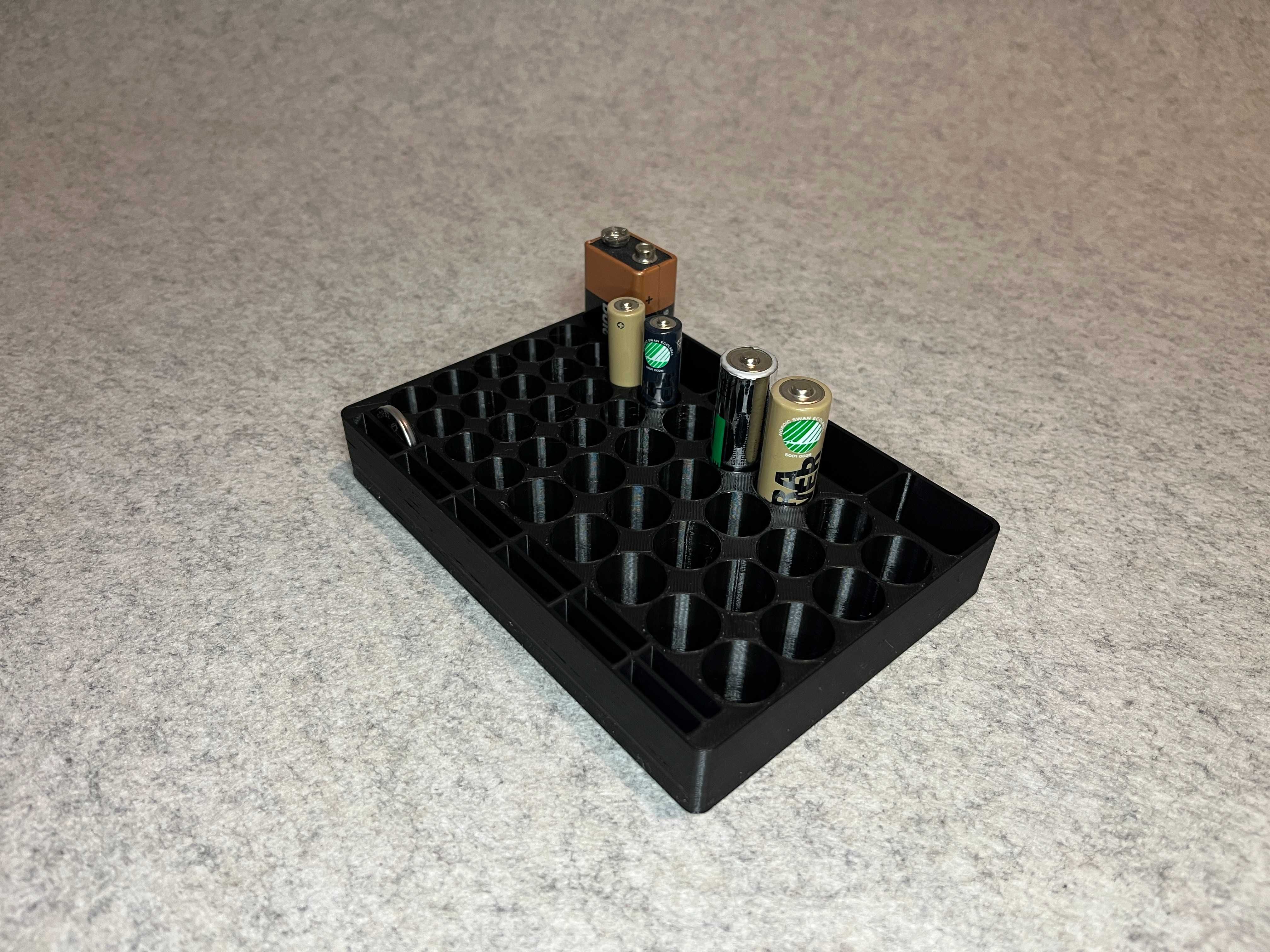Stojak podstawka na baterie AA, AAA, 9V, CR2032