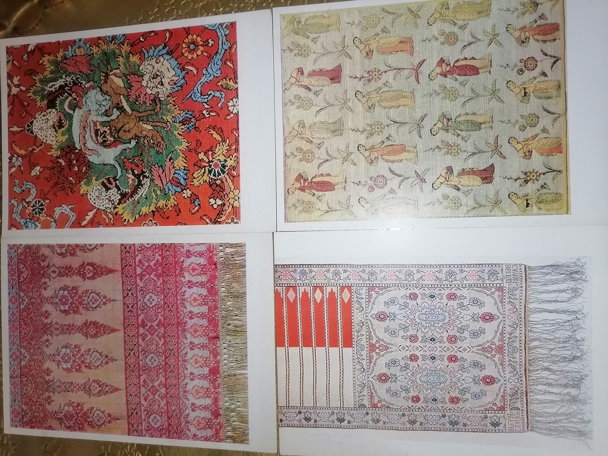 Kobierce, pasy kontuszowe, arrasy, tkaniny perskie na pocztówkach