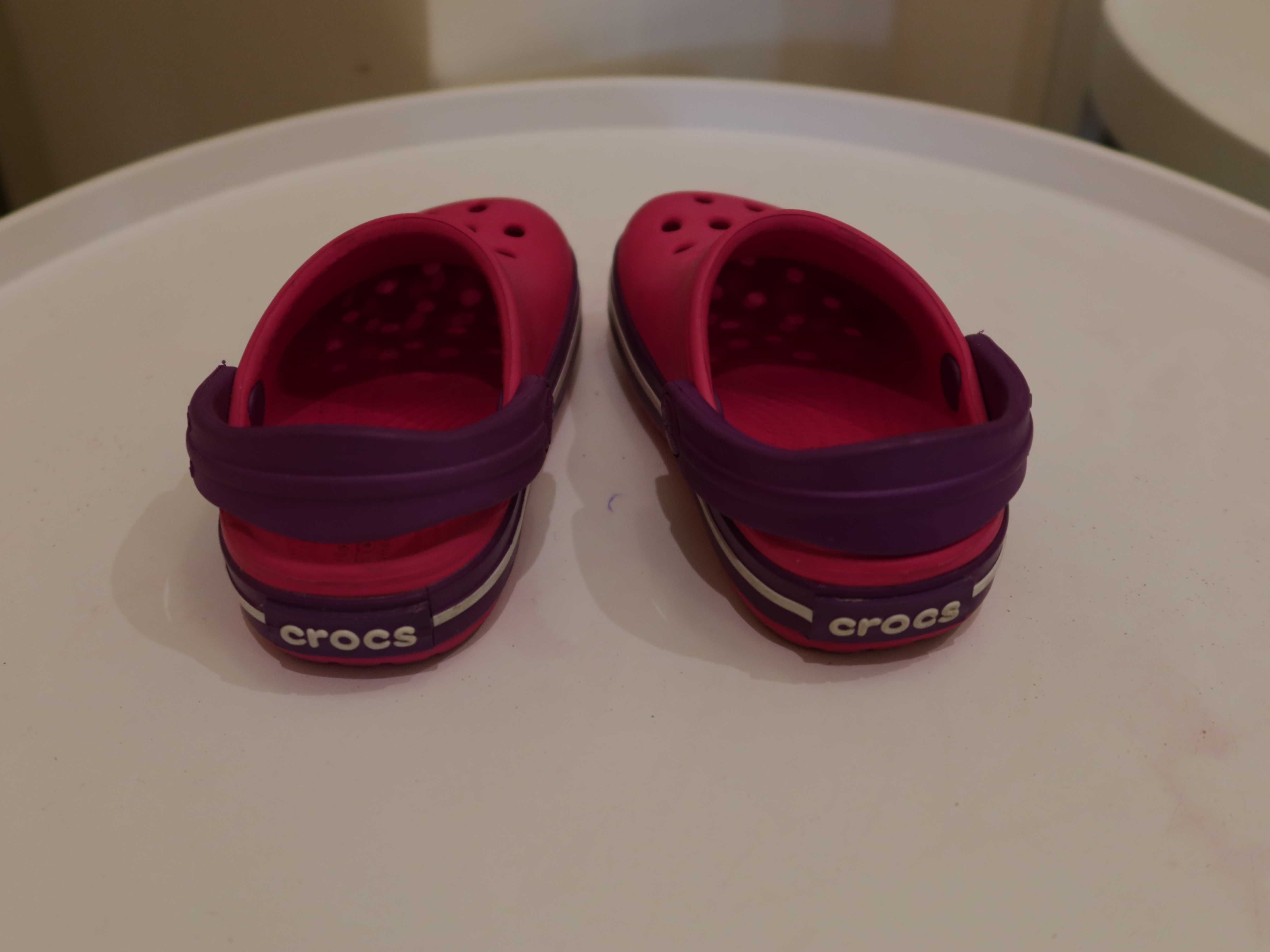 Дитячі капці гумові Crocs б/в розмір виробника C4 рожеві з фіолетовим