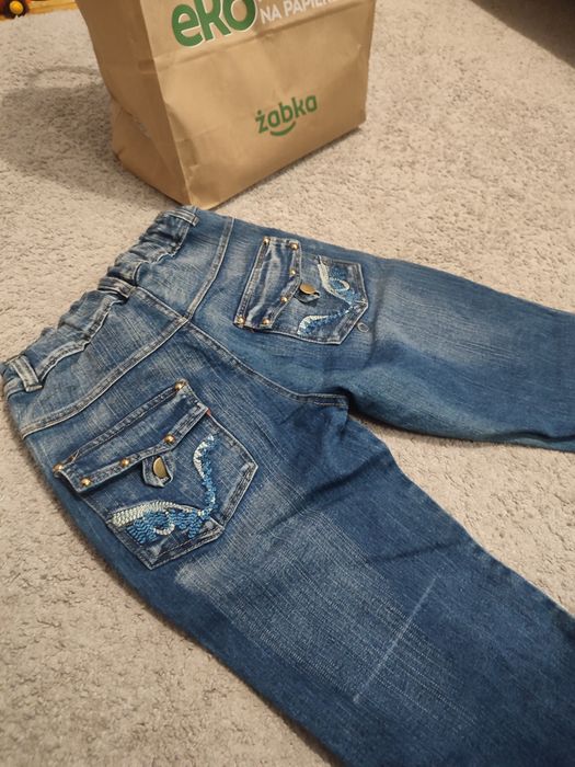 Джинси кльош, модні, нові