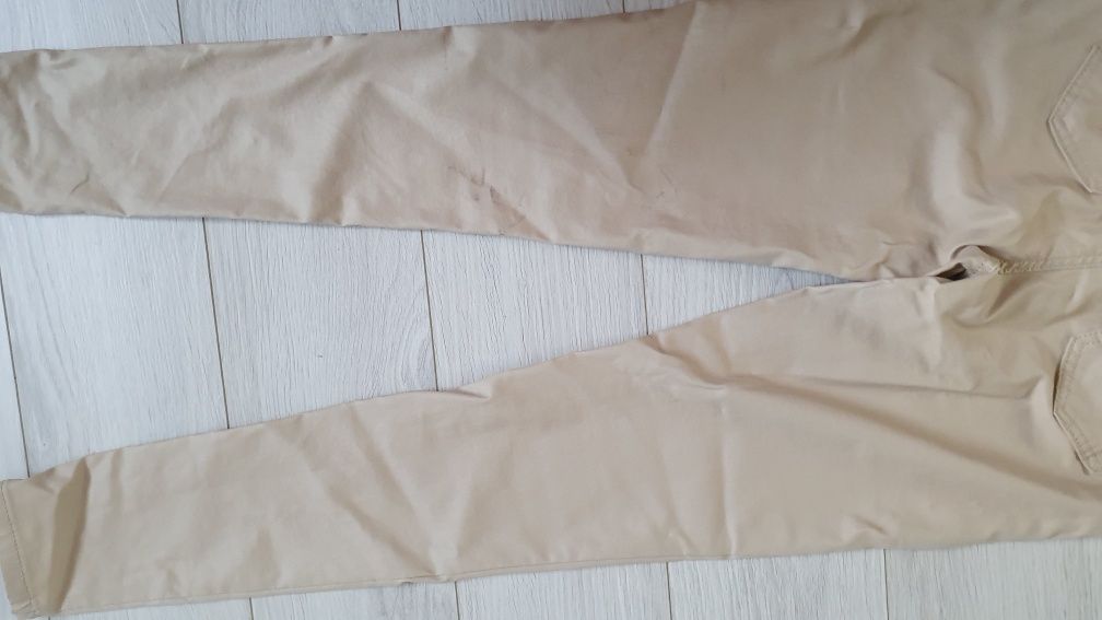 Spodnie woskowane skórzane 38 beżowe wiskoza