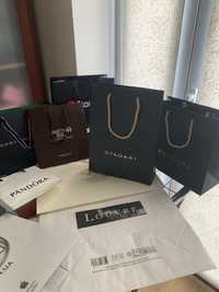 Пакети коробки подарунки брокард Dior Вікторія сікрет Saint Laurent