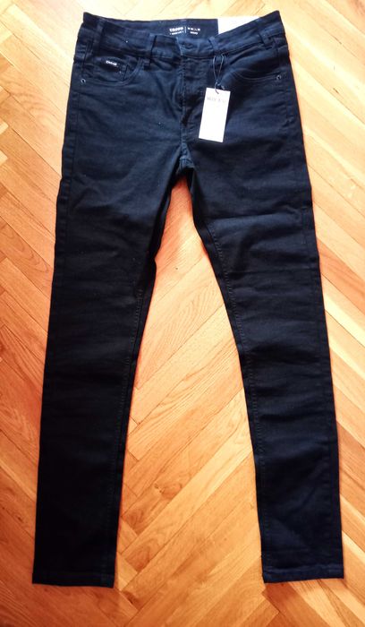 Spodnie jeansowe młodzierzowe z firmy Cropp Denim