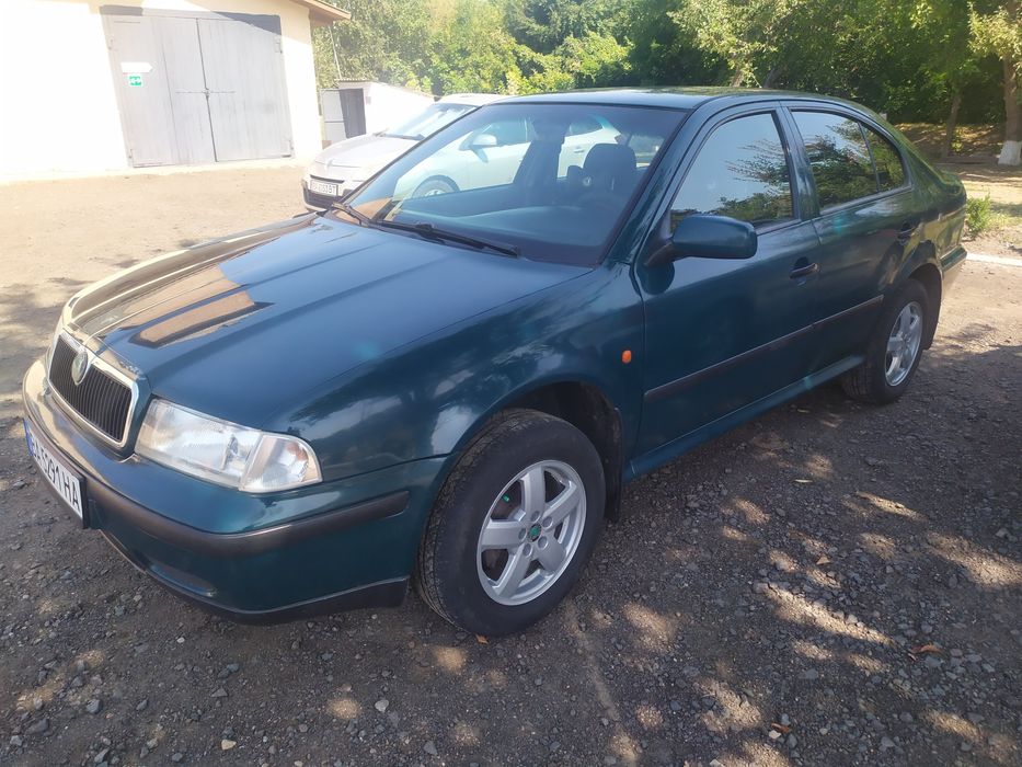 Шкода 1.6 газ/бензин