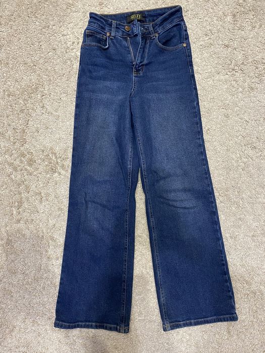 Джинсы синие клеш