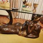Mesa de vidro com elemento