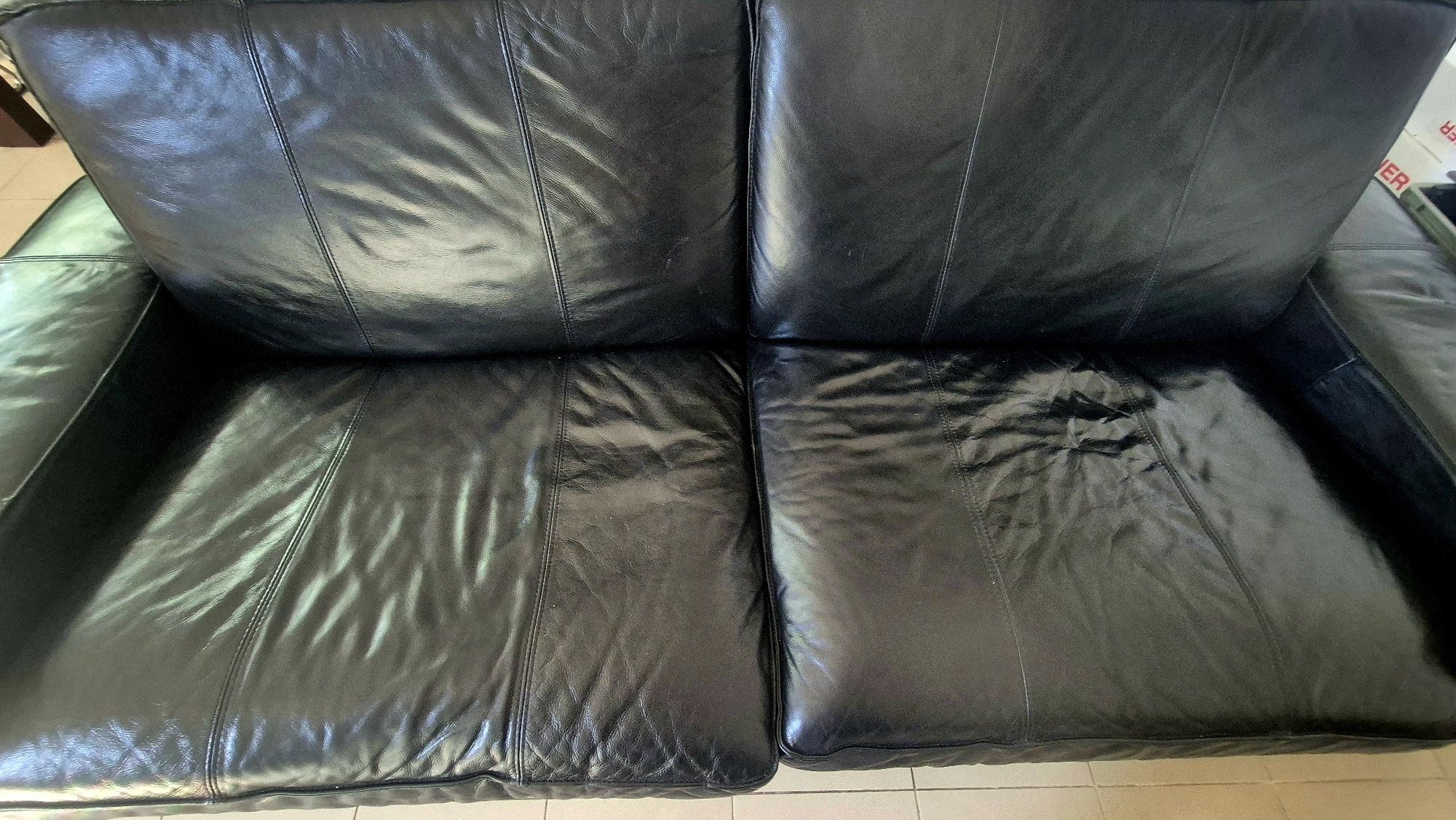 Sofá em couro 3 lugares