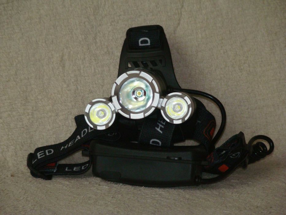 новый в упаковке мощный налобный светодиодный аккумуляторный фонарь ук