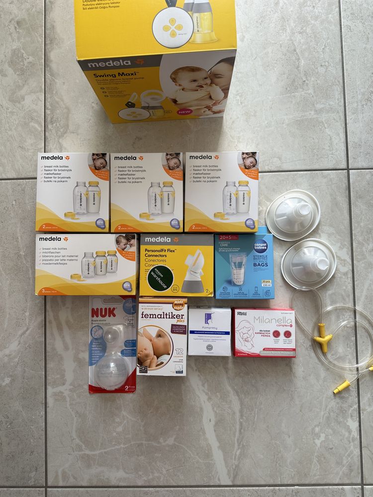 Laktator medela maxi swing nowy + akcesoria i dodatki do karmienia