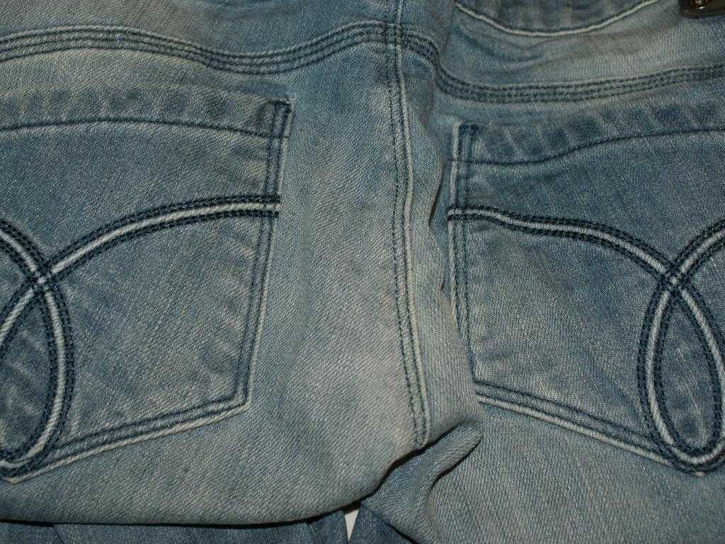 Calvin Klein męskie jeansy BODY skinny blue 29 S