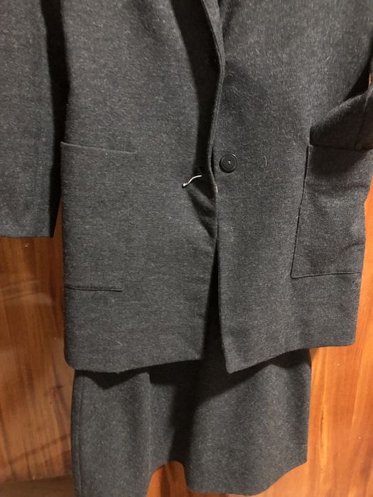 Conjunto mini saia casaco comprido, com botões usado