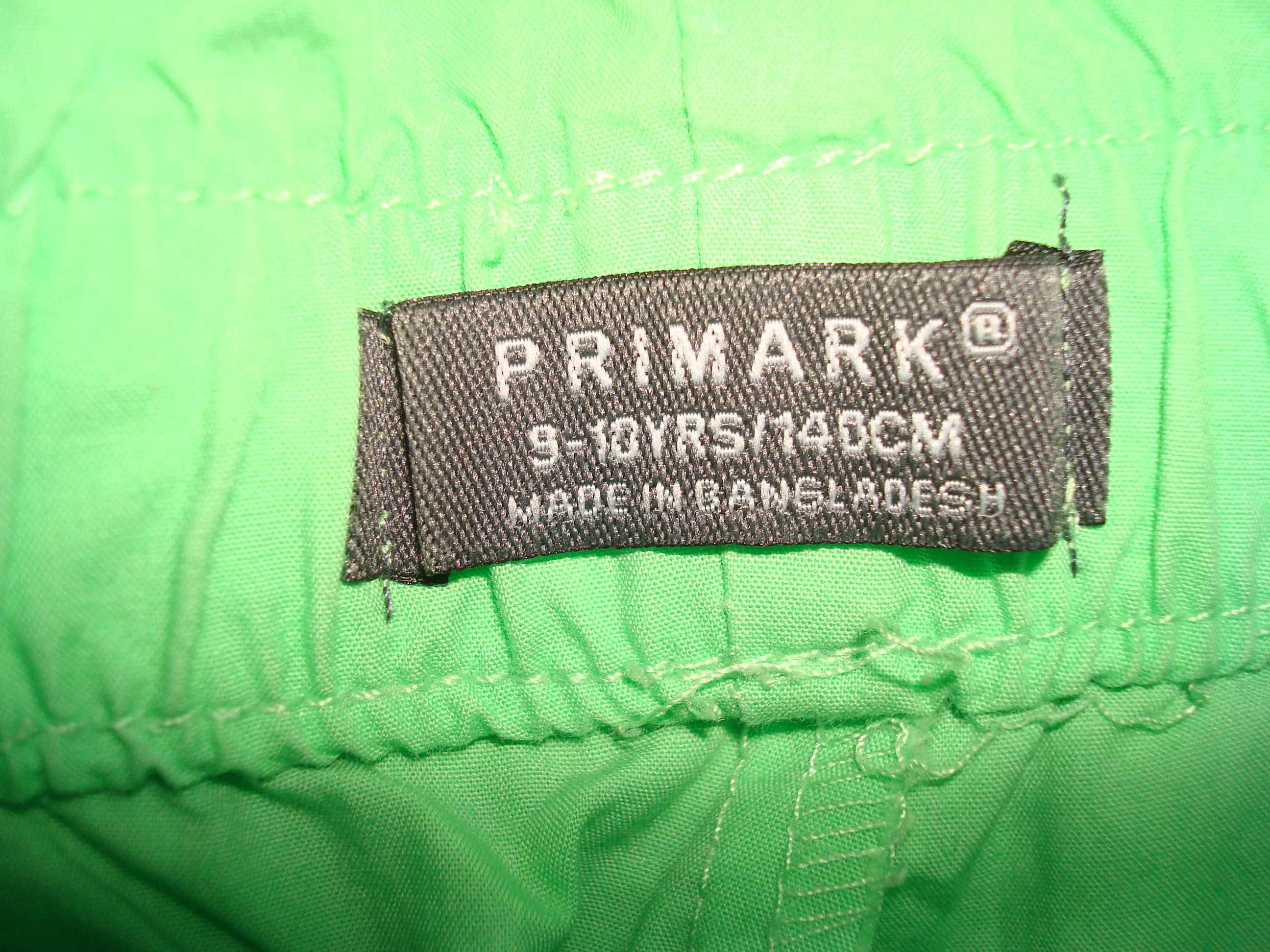 Zielone spodnie spadochrony na lato Primark rozmiar 140 cm
