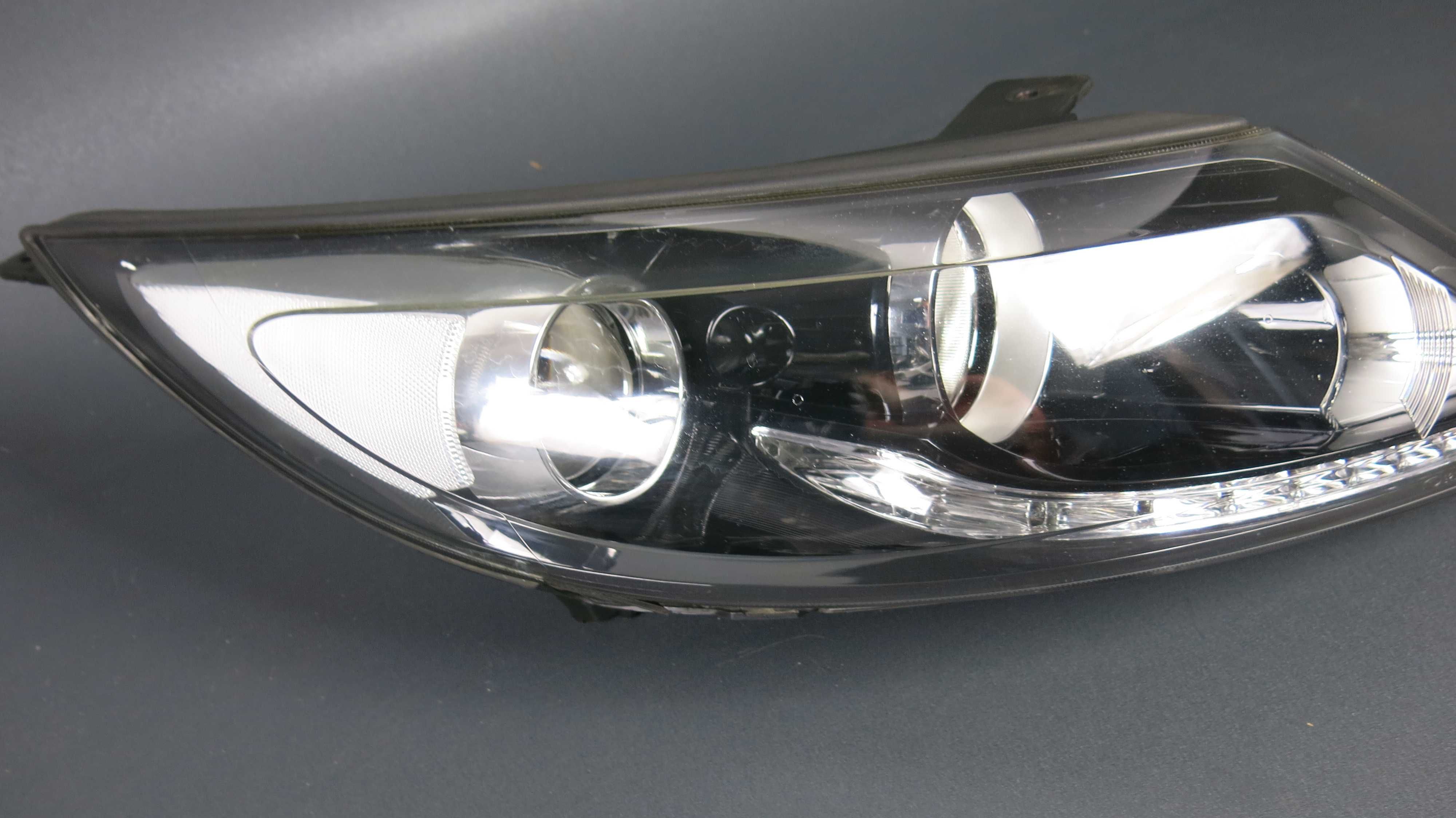 KIA Sportage III 3 lampa przednia przód prawa