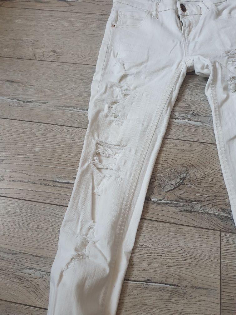 Spodnie przecierane Stradivarius XS