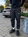 Нейлонові штани Nike Swoosh