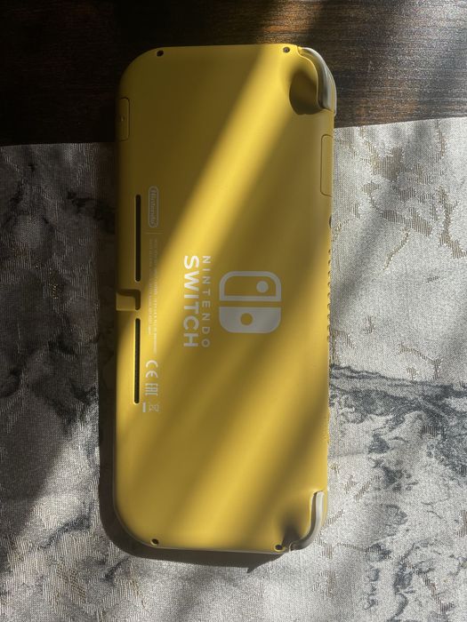 nintendo switch lite żółta+ 9 gier