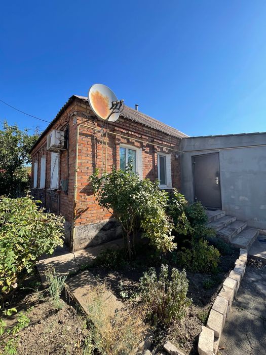 Продам дом возле центрального рынка
