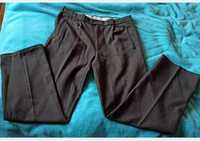 Materiałowe ciepłe spodnie melanż L XL 182