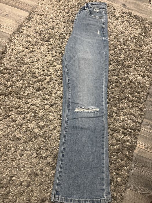 Jeansy dzwony niebieskie 36, z przetarciami
