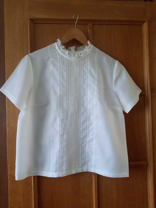 Блуза жіноча біла.