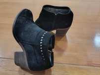 Botins pretos da Seaside