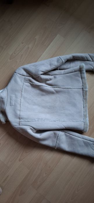 Casaco pele sintética  com pelo por dentro