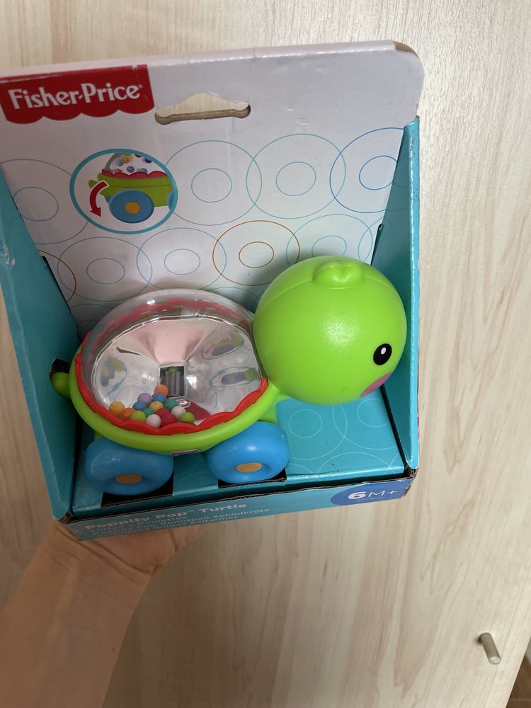 Іграшки-каталки, іграшка з кульками Fischer-Price