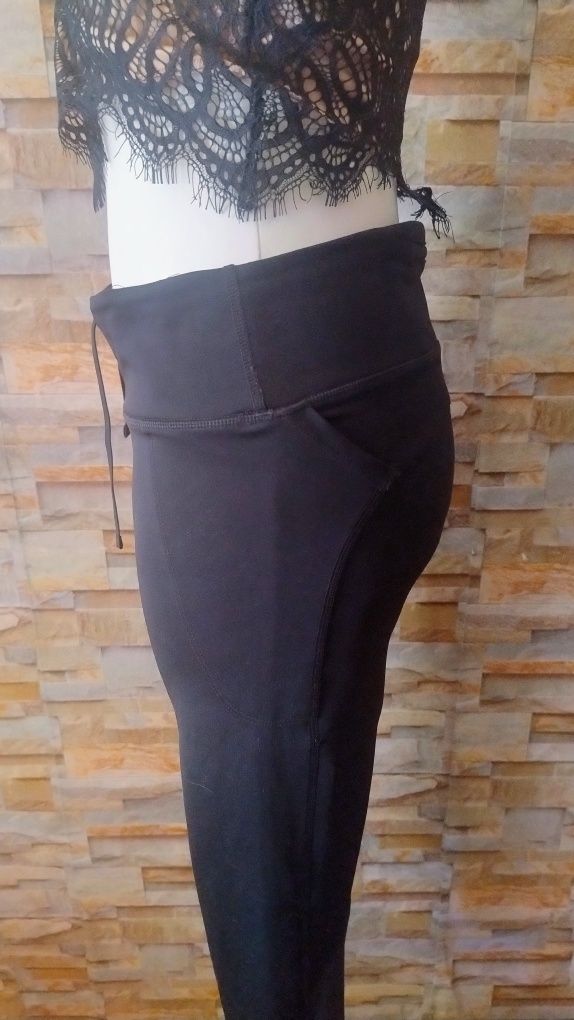 Sportowe legginsy damskie rozmiar L. Nike dri -fit