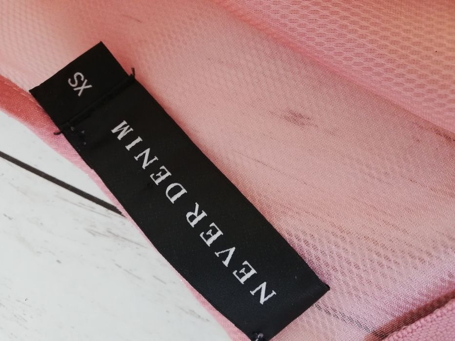 Bluzka z falbanami i suwakiem Never Denim