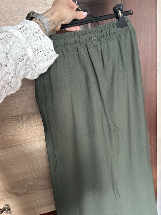 Luźne spodnie szerokie khaki dzwony luźna nogawka