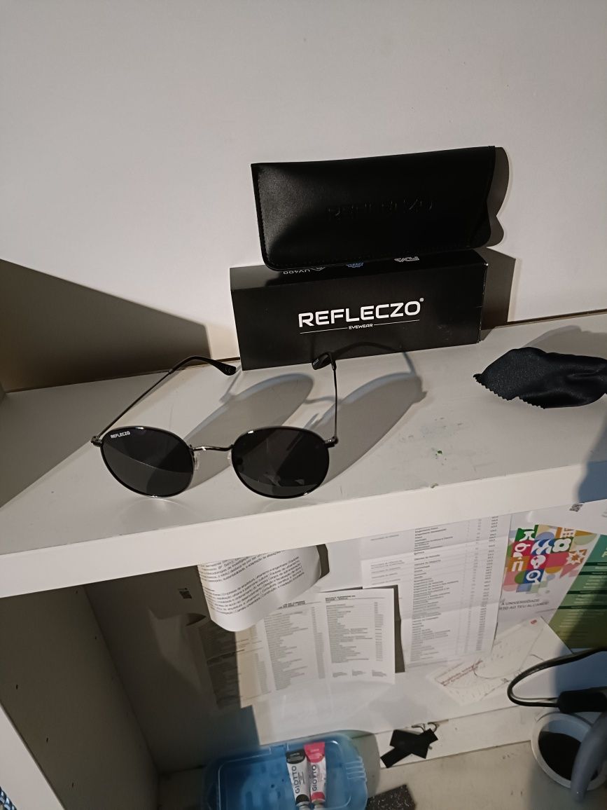 Óculos de sol reflexo