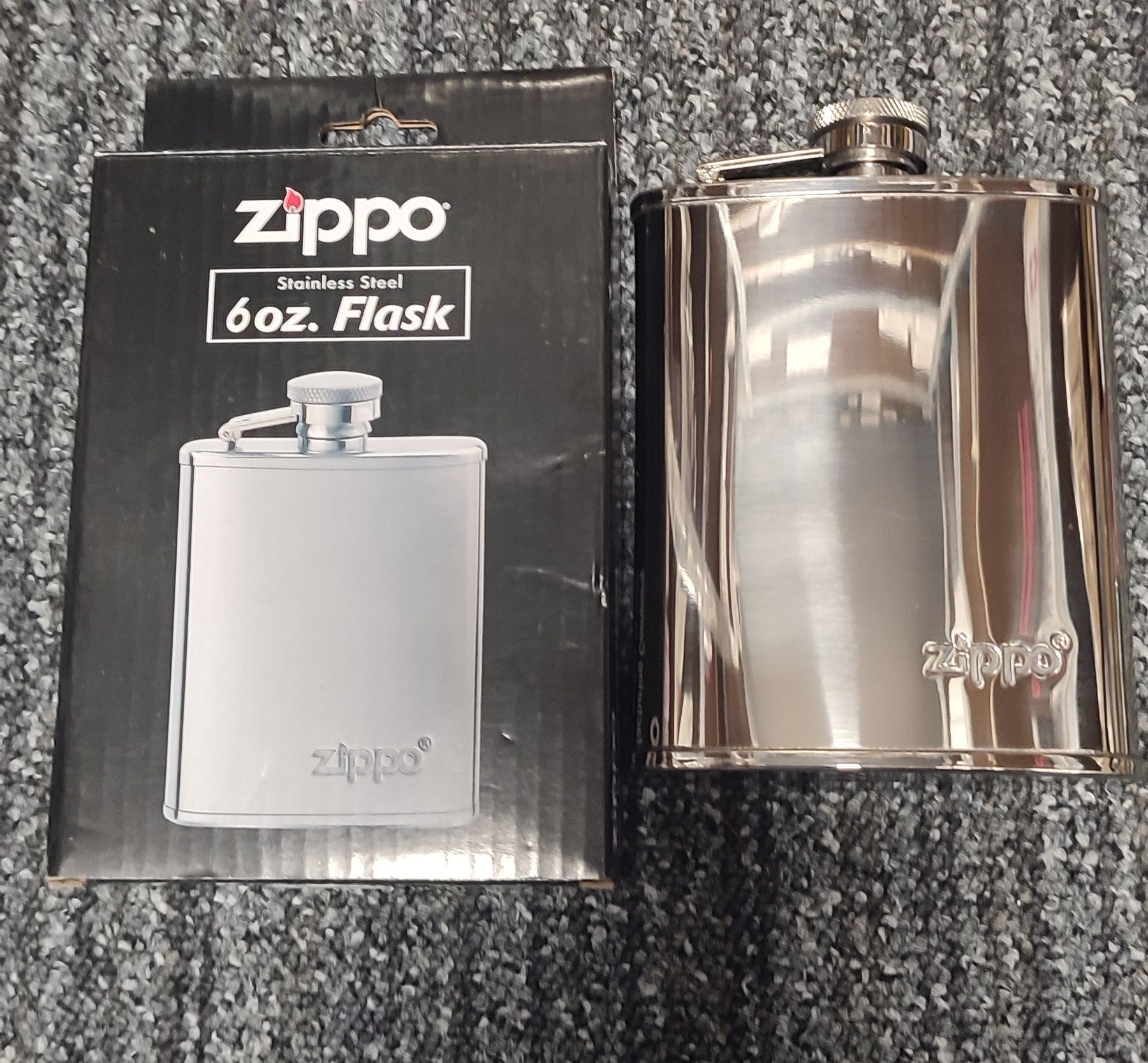 Оригінальна фляга Zippo 180  мл 

Объем 3oz. Фляга имее