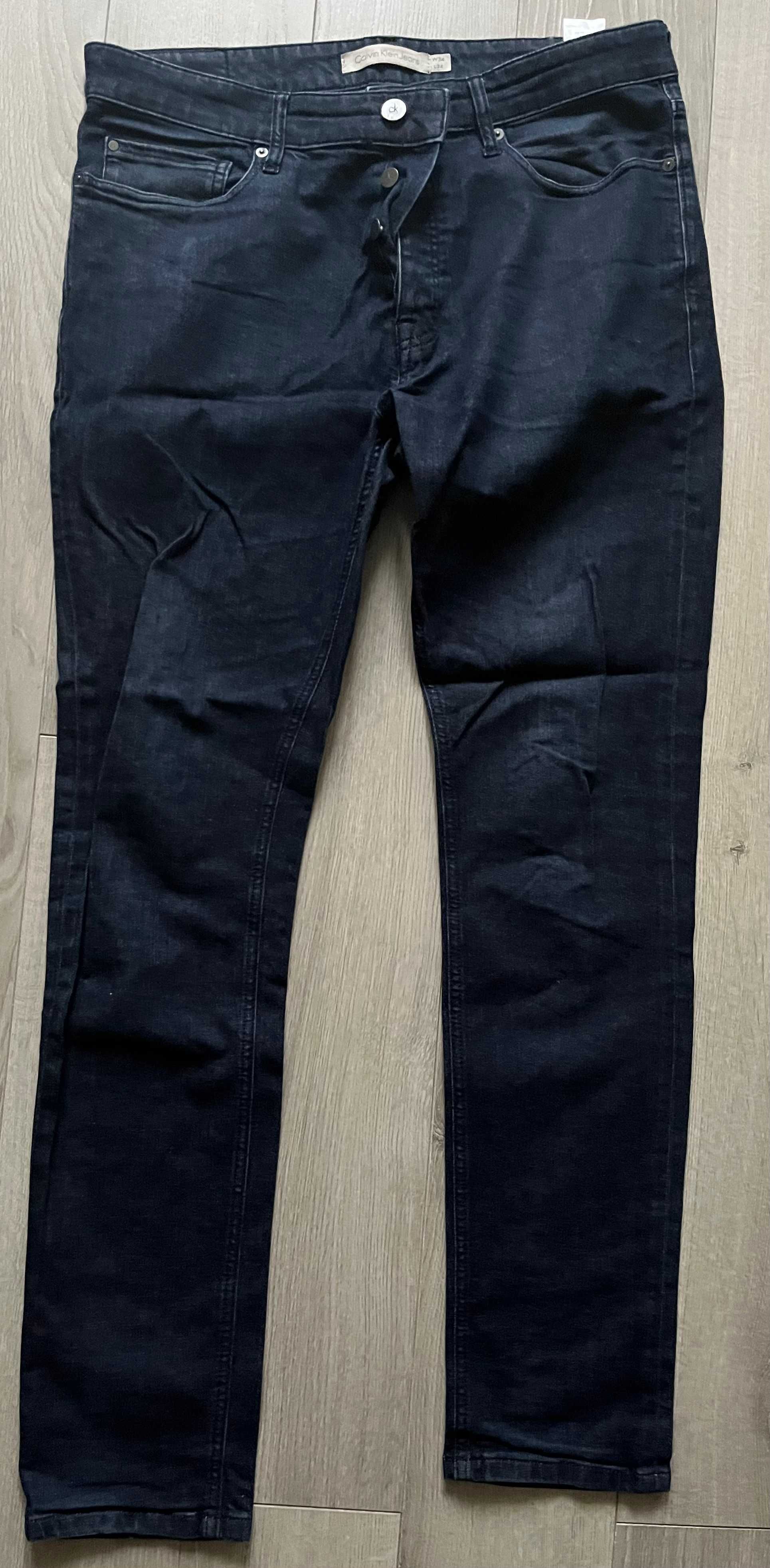 Granatowe jeansy Calvin Klein taper rozmiar 34/34