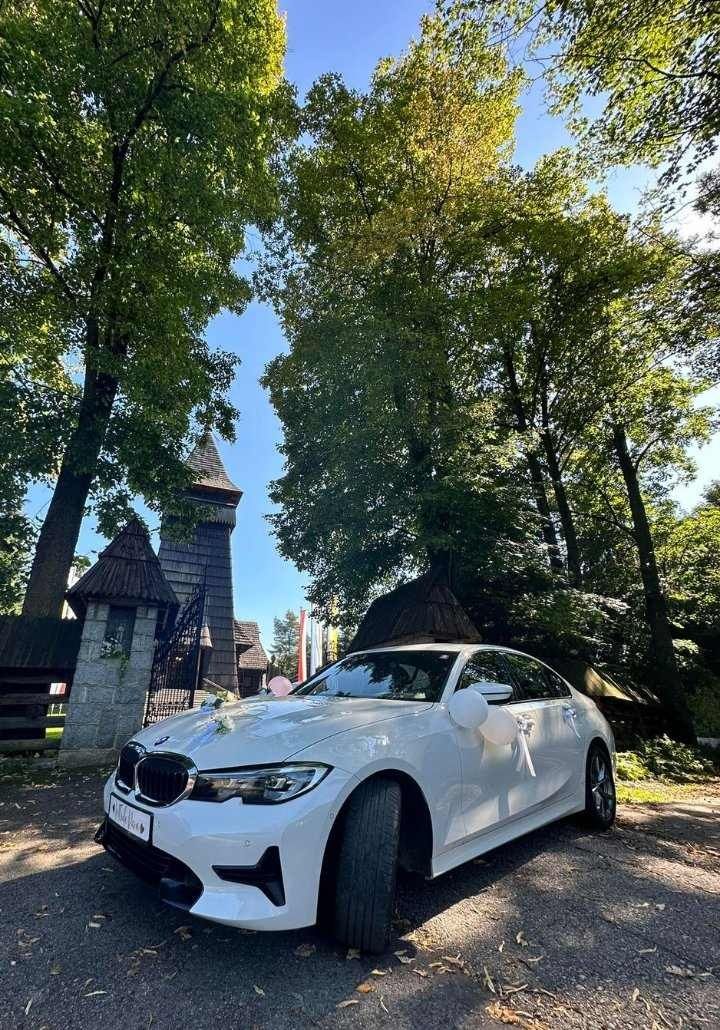 Samochód do ślubu /Auto do ślubu. Białe BMW Limuzyna M pakiet 2022r