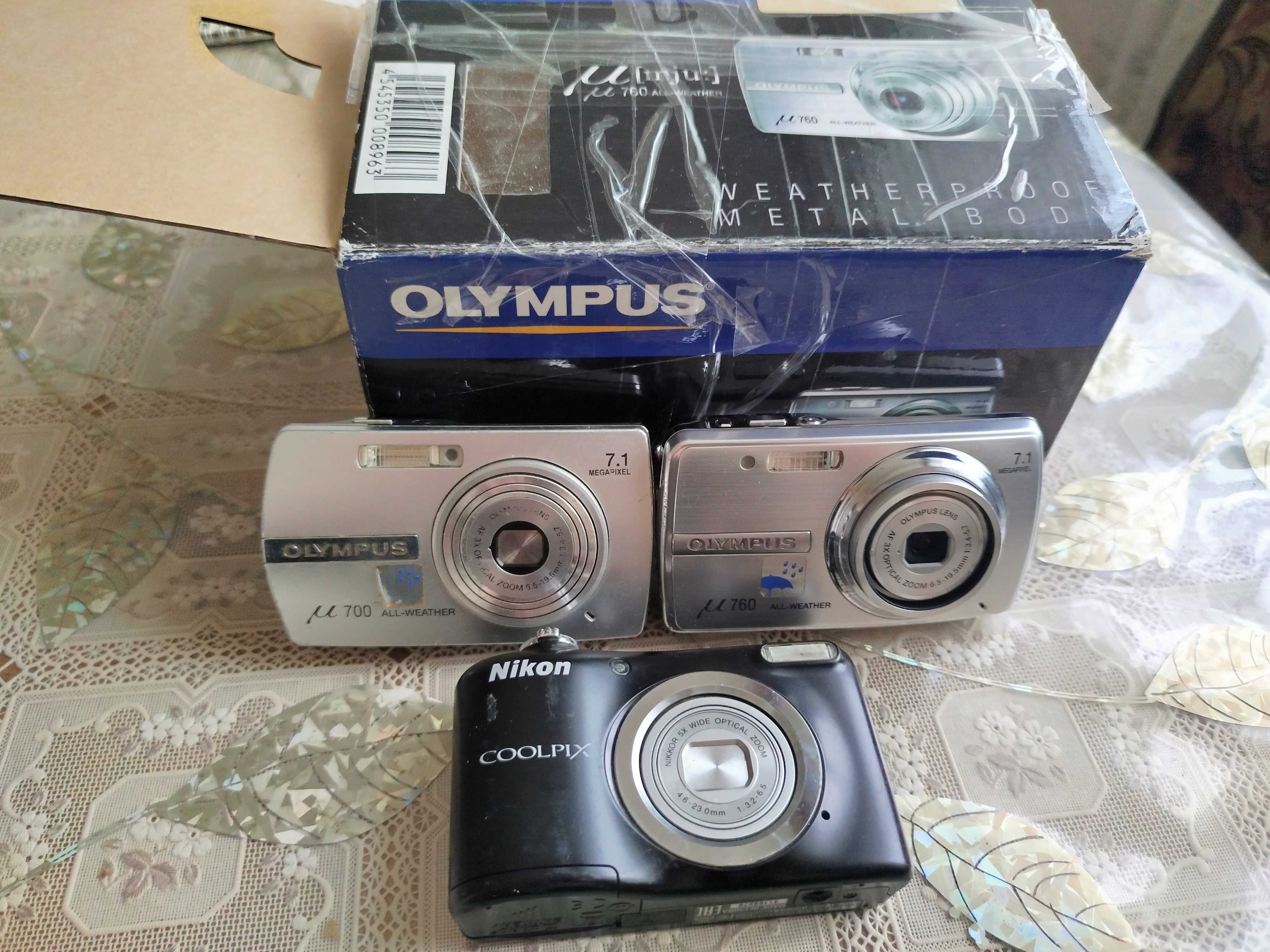 Фотоапарати Olympus, Nikon