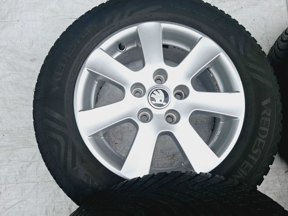 koła felgi aluminiowe z oponami całoroczne skoda octavia ii 195/65r15