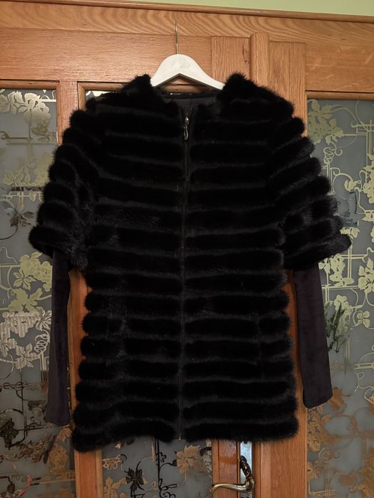 Продам меховую жилетку