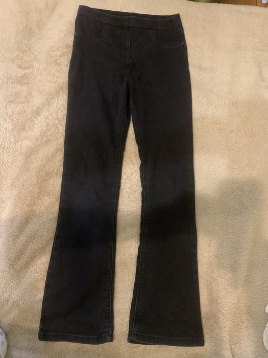 Чорні кльош джинси