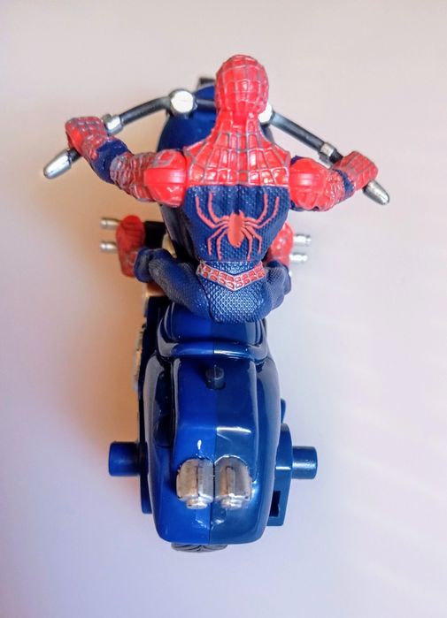 Spiderman articulado com a sua moto.Não é negociável.