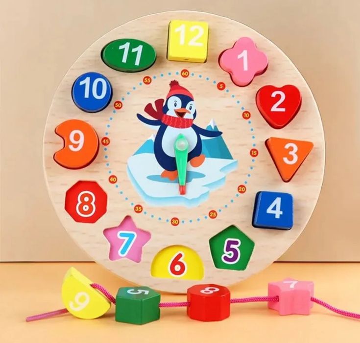 Дошка монтесорі з фігурами та годинником