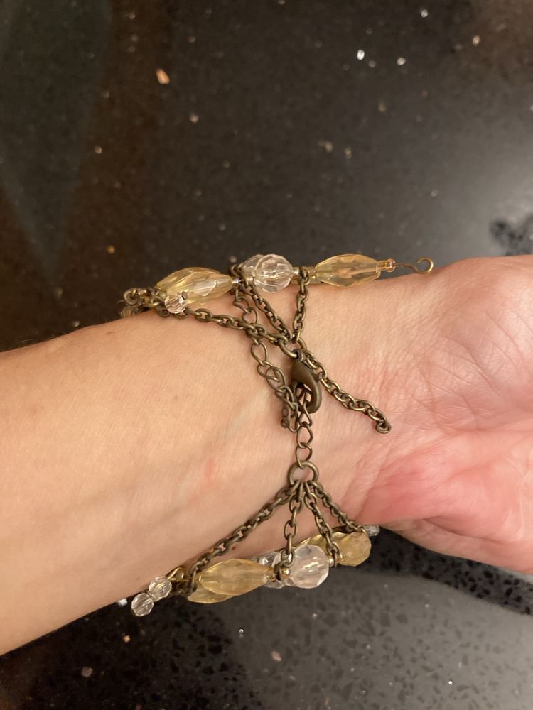 Pulseira com pedras amarelas/transparentes