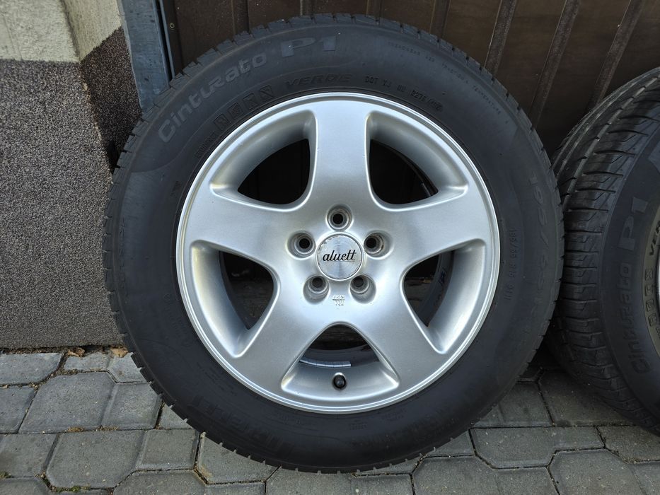 Felgi z oponami 195/65R15 VW Golf 4 5x100 New Beetle Audi A3 Bora octa