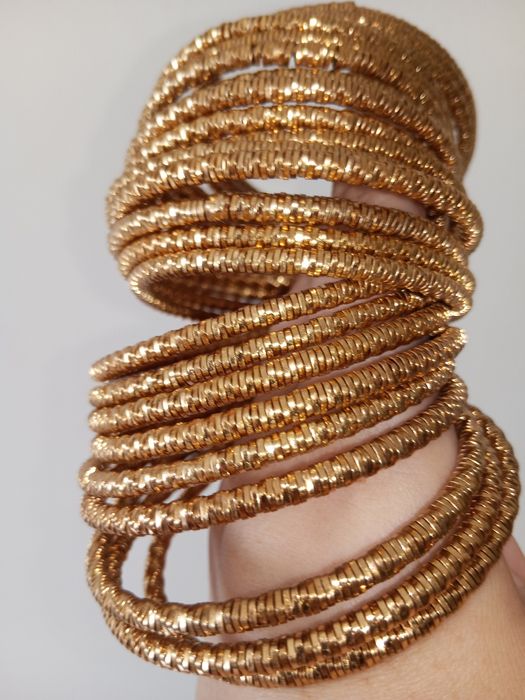 Pack 24 pulseiras douradas