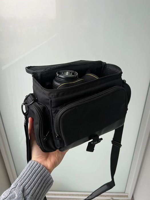 Nikon D5100 + Nikon DX 18-55 mm