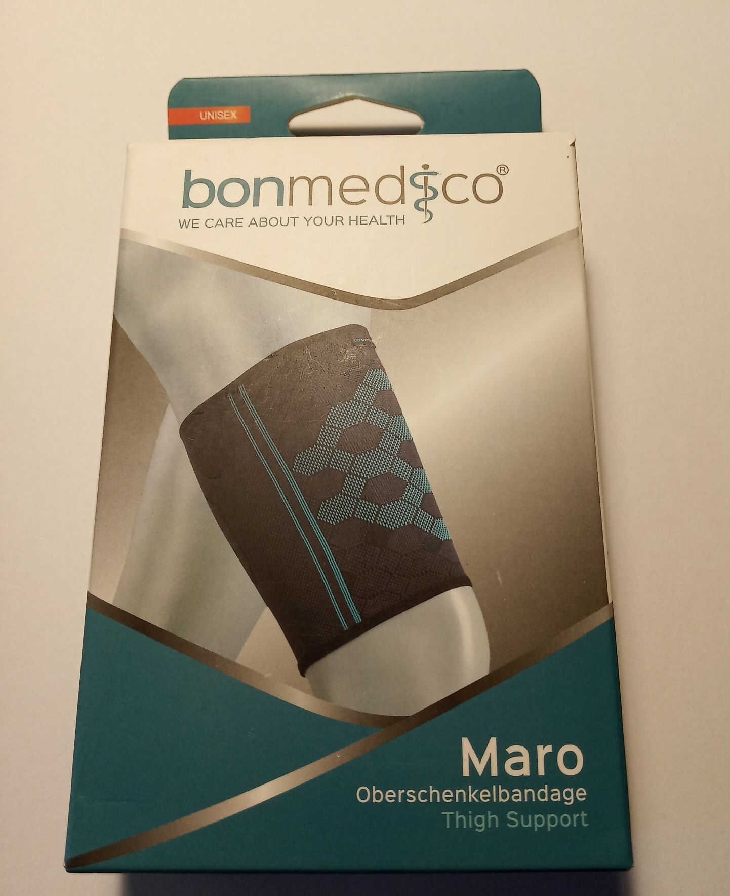 Компресійний бандаж для стегна bonmedico.