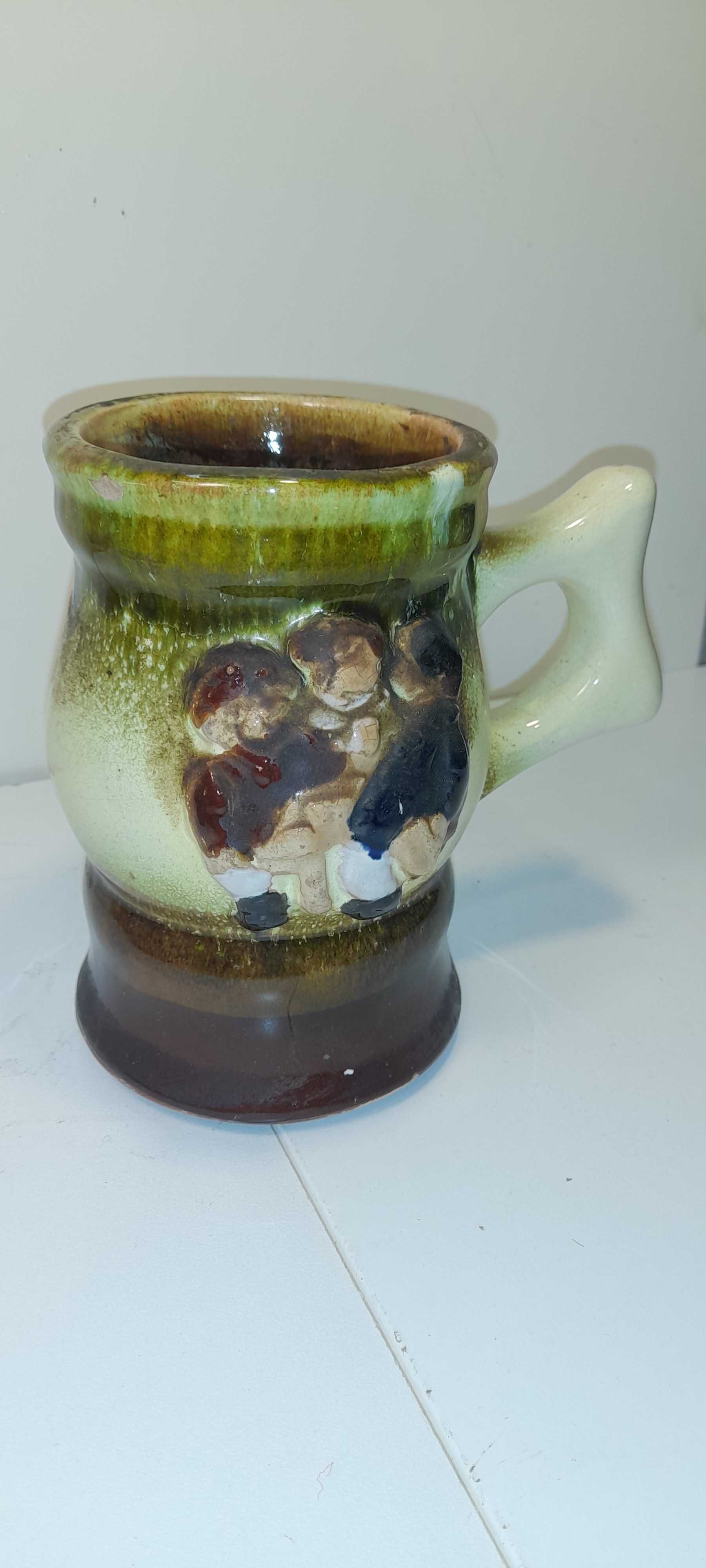 Stary kufel ceramiczny .